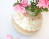 White and tan vase with shino style glaze