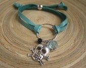 Adjustable leather charm bracelet, teal, skull and cross bones