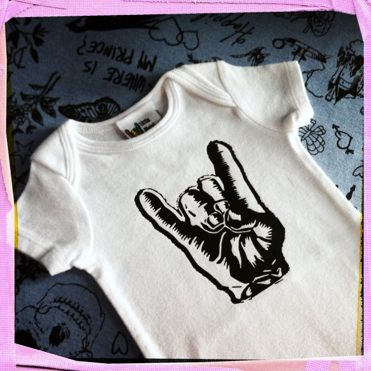 Punk Baby onesie - Rocker / Metal hand gesture in a newborn white onsie. Gender Neutral / Unisex