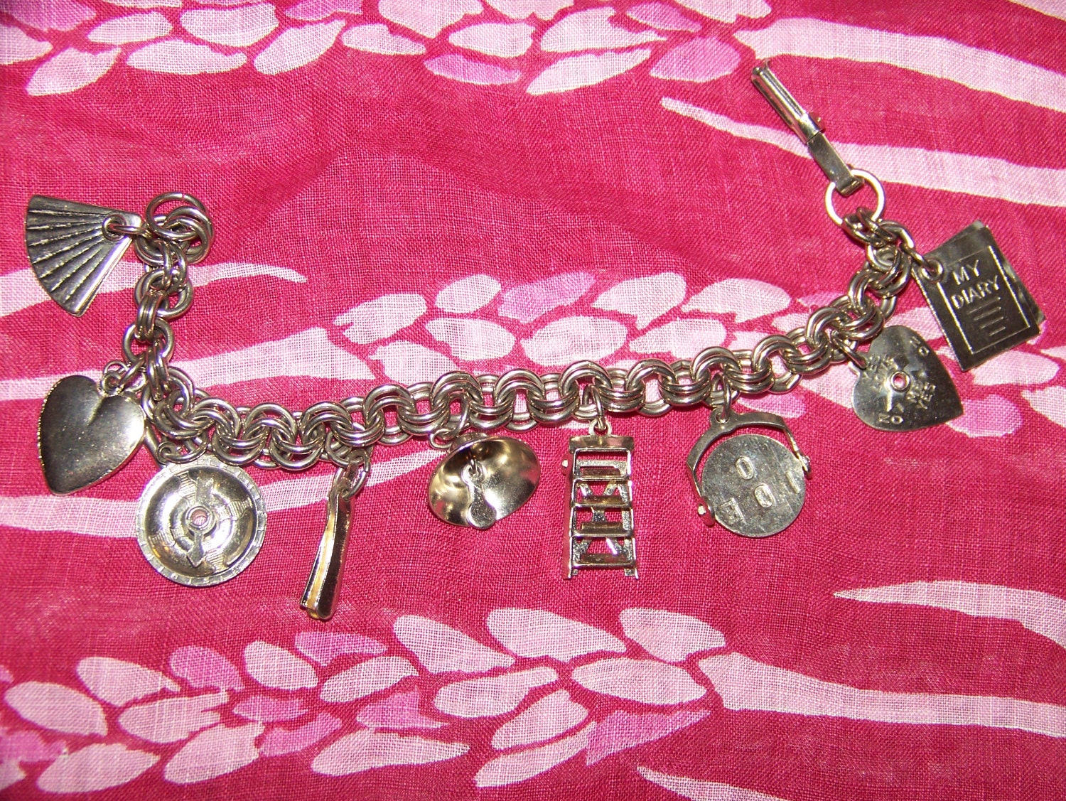 Fun Articulated 9 charm Bracelet Silvertone 1960's REDUCED