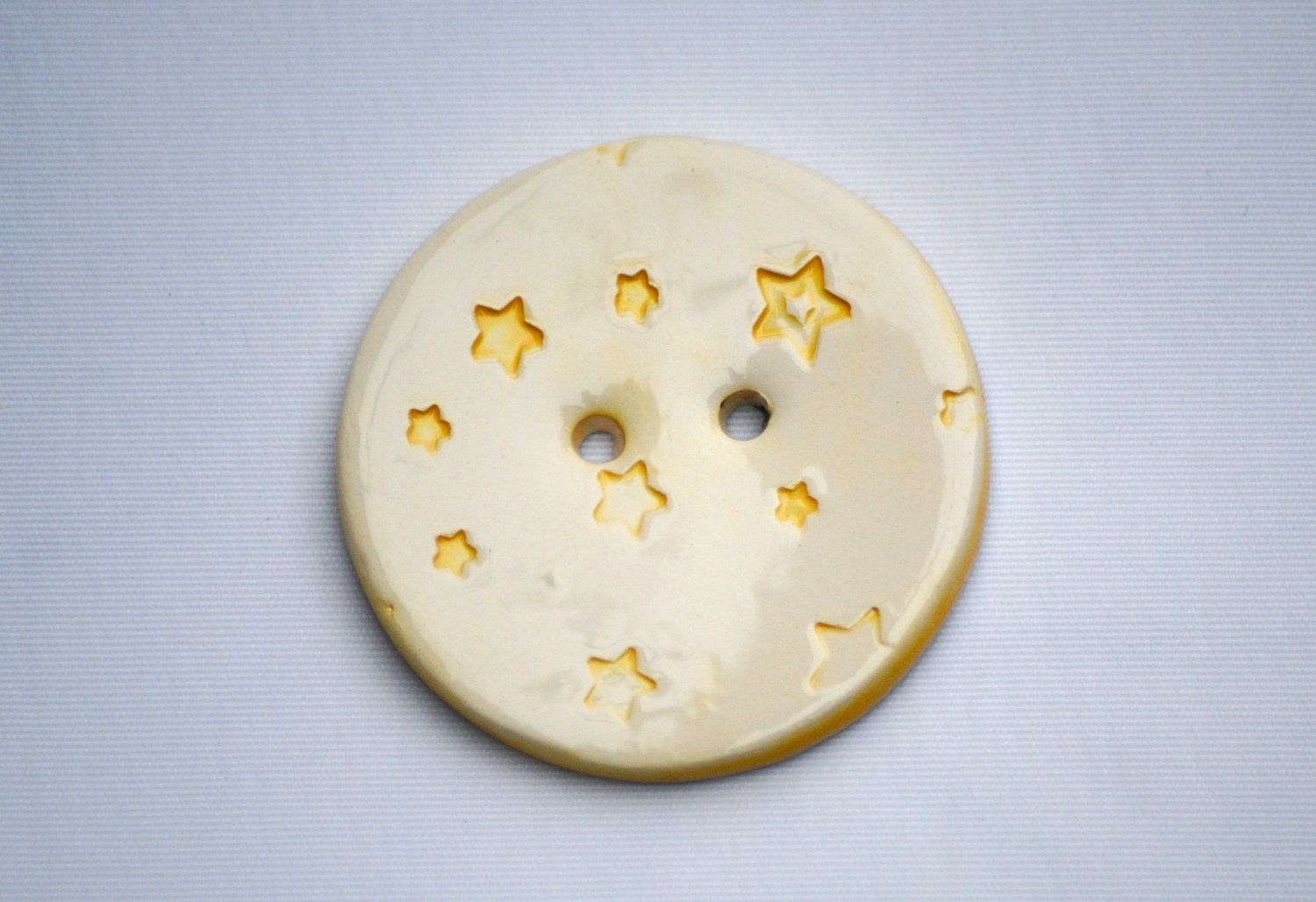 Yellow stars button ceramic round button with a galaxy of bright yellow stars