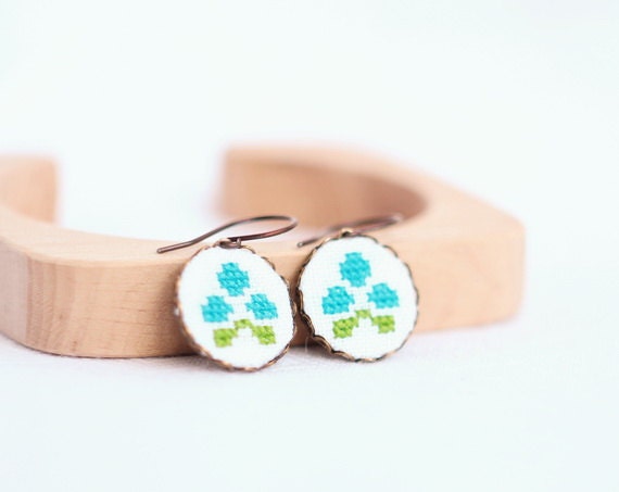 Cross stitch earrings with floral ornaments