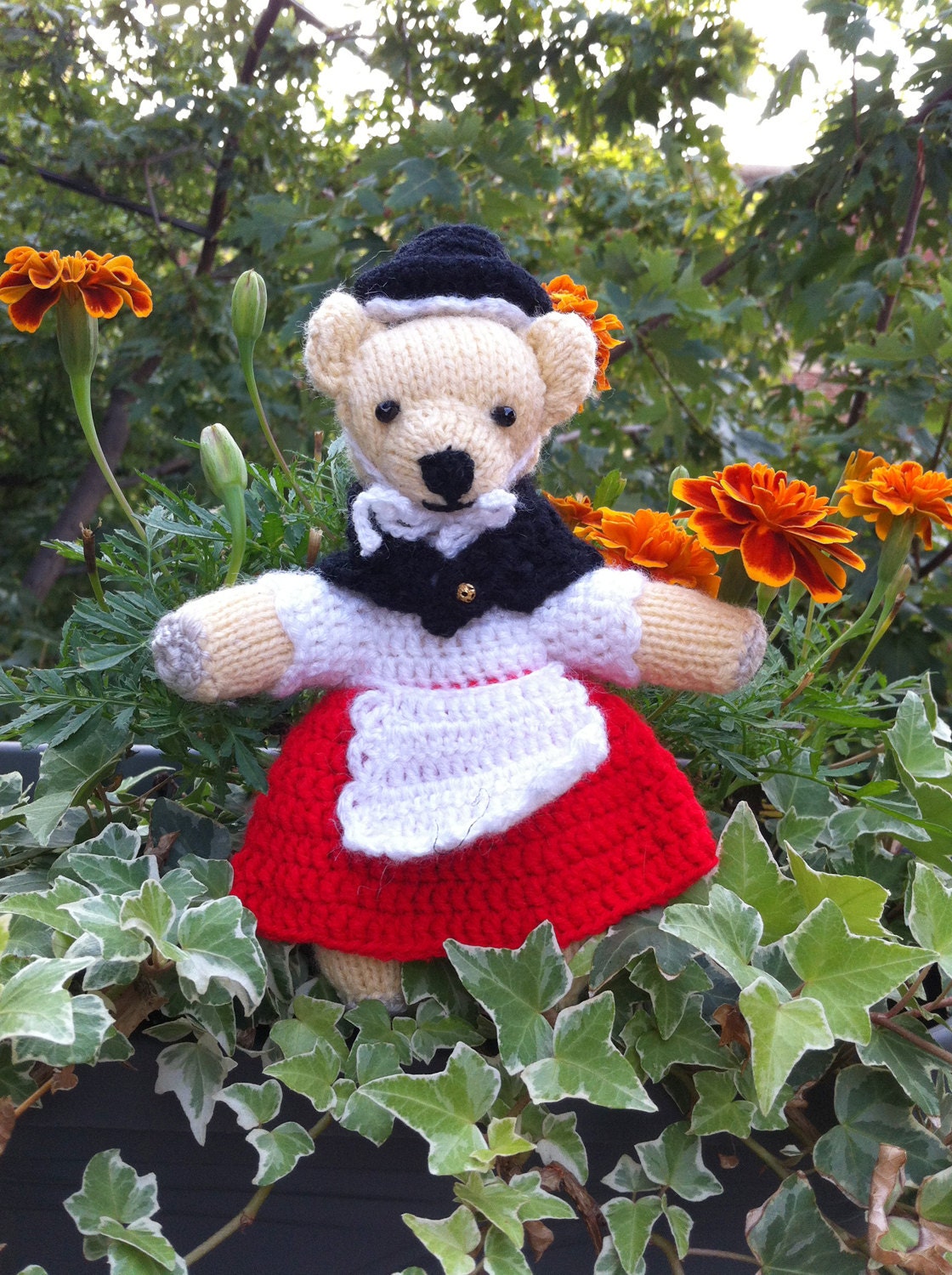 Welsh Bear: Knitted toy bear in Welsh national costume.