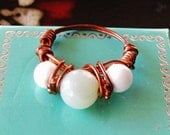 Antiqued copper and gemstone rounds wrapped rings