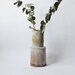 Creamy stoneware vase with hatch mark details
