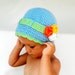 Crochet children hat in blue, decorated with green crochet ribbon and flowers- Ready to Ship
