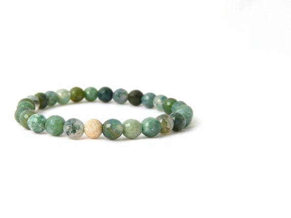 moss agate bracelet with gold focal bead. small stacking yoga stretch bracelet in green, teal, olive and aquamarine.