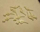 Destash of white plastic gun charms