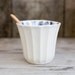 Mixing bowl with small wooden spoon / Bol à mélanger avec petite cuillère de bois