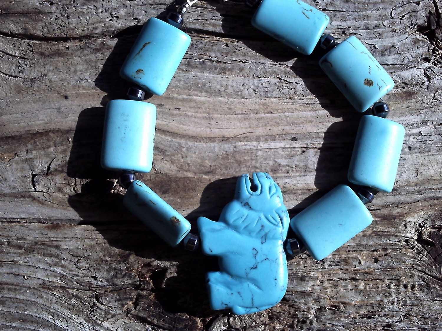 Magnesite ,hematite, lion bracelet 8 1/2 inch - windinhishare