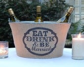 Eat Drink And Be MARRIED.. Burlap covered wine/beverage tub.  Rustic Chic decor for wedding reception