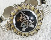 Vintage SIAM Bracelet, Asian Figural, Black Cabochon, Cream Celluloid, Silver Tone Chain, Floral Circles, 1960s Mad Men Costume Jewelry