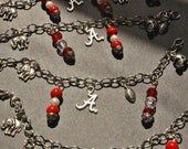 ALABAMA Crimson Tide football charm bracelet with hand beading, tibetan silver charms of A logo, elephants, football, and helmets. ROLL Tid