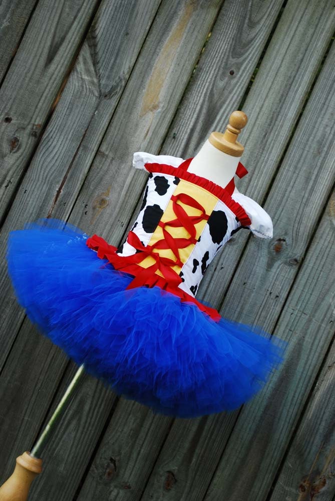 Custom Toy Woody or Jessie story inspired tutu dress corset set made to fit in a size 12 months through 5T. Larger sizes available