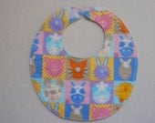 Baby bib, four soft layers, reversible, multi colored with cute animal faces