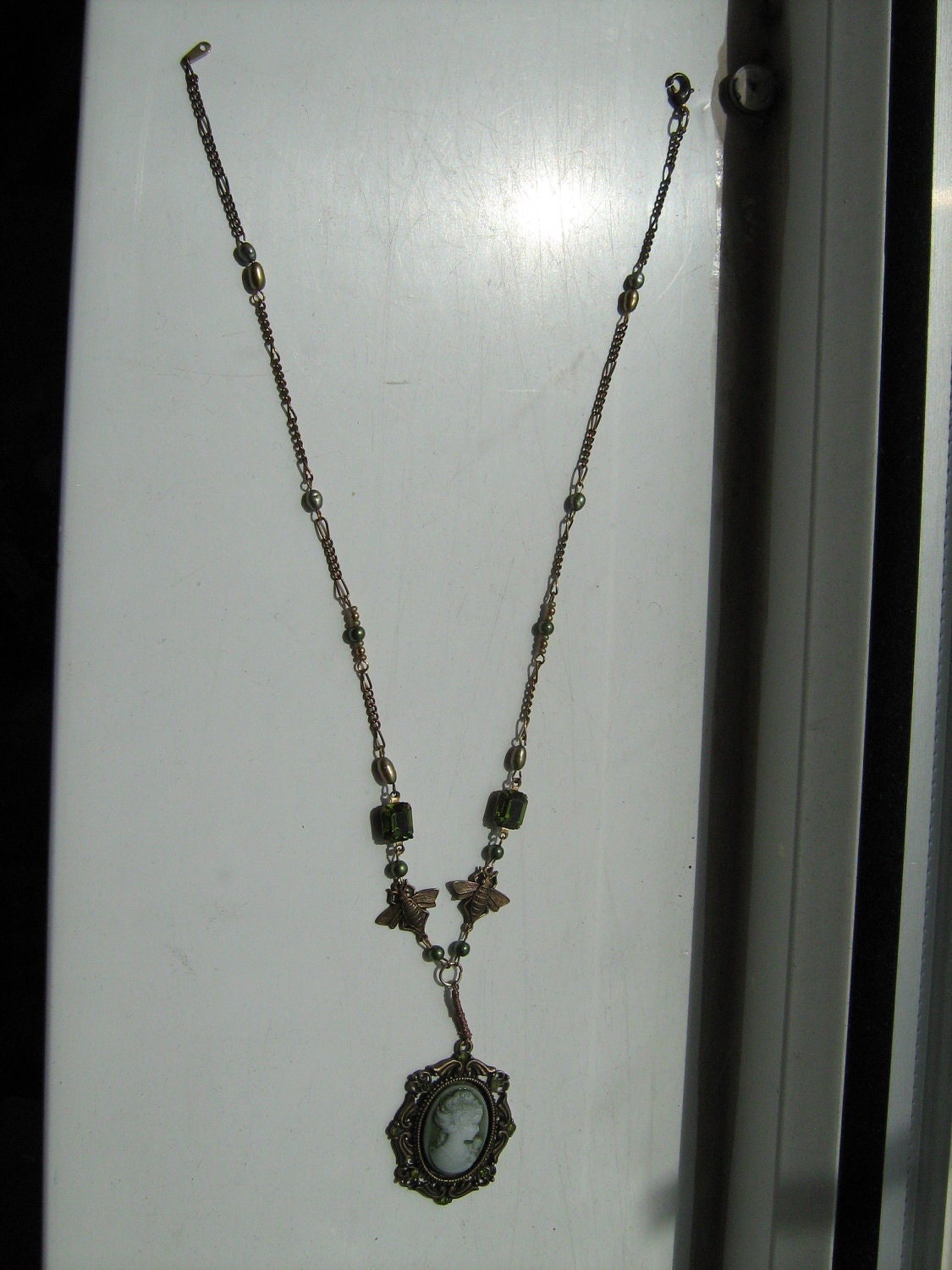 Green crystal, freshwater pearl and cameo necklace