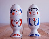His and hers salt and pepper shakers and egg holders