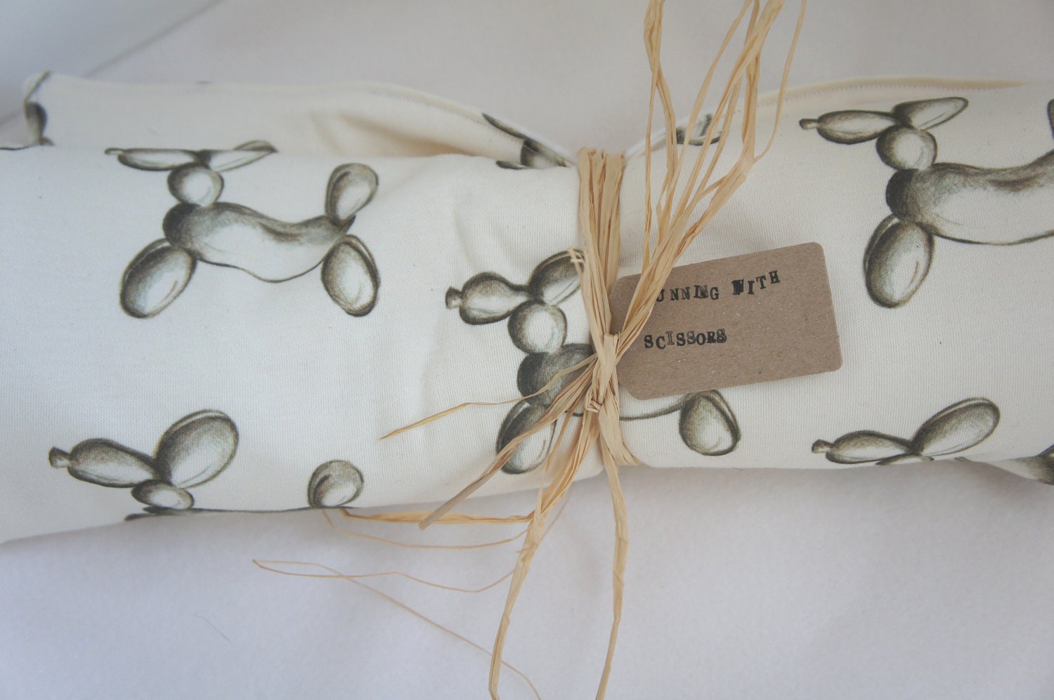 Organic baby Blanket: Balloon Sausage dogs on natural Organic Cotton and Poly fleece.