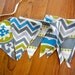 Fabric bunting banner. Grey, turquoise, and olive green are perfect together in this fabric banner to use for any occasion.