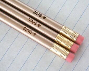 sing heart 3 gold pencil set. engraved pencils for back to school and chanteuses, choirs, and karaoke addicts.