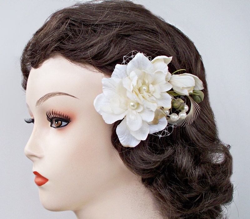 Vintage Inspired Bridal Hair Fascinator of ivory delphinia, pearls, feathers and french netting.