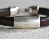 Leather bracelet in dark brown with distressed finish and long silver slide bead and silver clasp