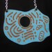 Cell necklace -- laser etched book cover -- science geekery