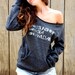 Eco-friendly off the shoulder sweater in Eco-black, Inspirational Ralph Waldo Emerson quote
