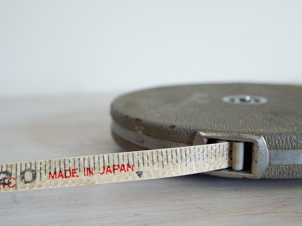 vintage round tape measure