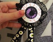 Purple Eyeball Badge with Black Lace and Ribbons