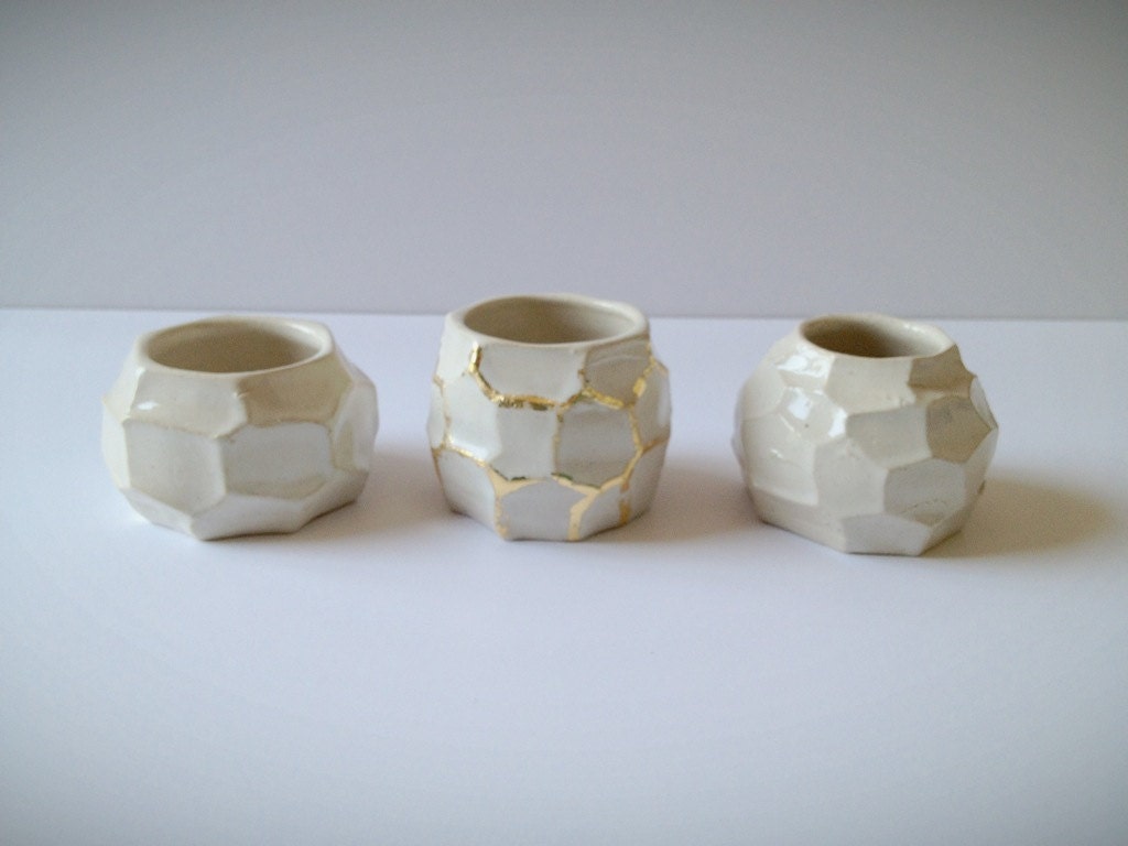 white and gold faceted bud vase
