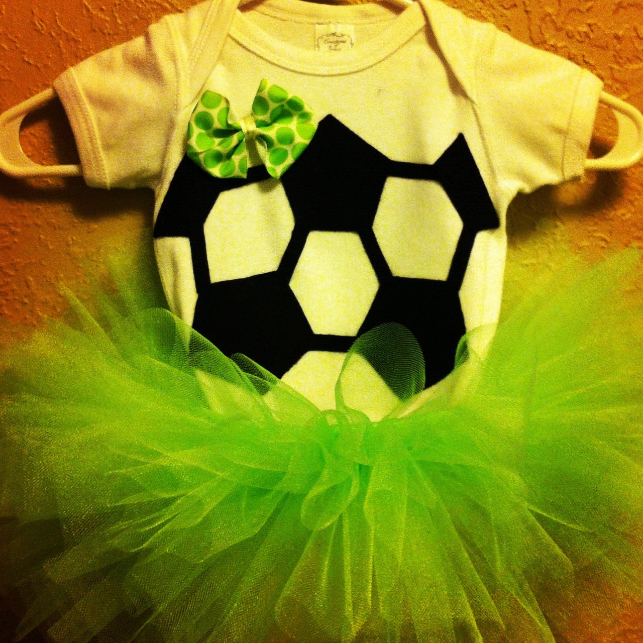 Soccer baby onesie and tutu With matching hair bow in sizes 0-3mo, 3-6mo, 6-12mo, & 24mo