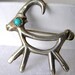 vintage dead pawn sterling brooch turquoise eye deer mid century western Navaho folk art