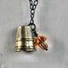 Thimble and Acorn Kisses Peter Pan and Wendy in Shiny Brass