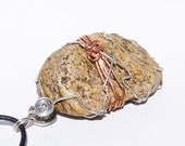 Wire wrapped brown beach stone pendant necklace