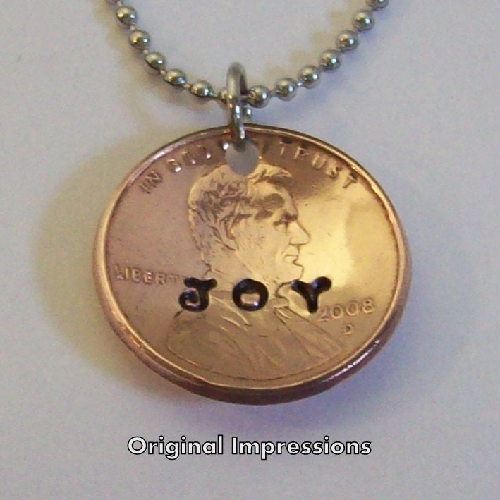 Joy - coin jewelry pendant necklace made of a genuine U.S. penny on a stainless steel chain.