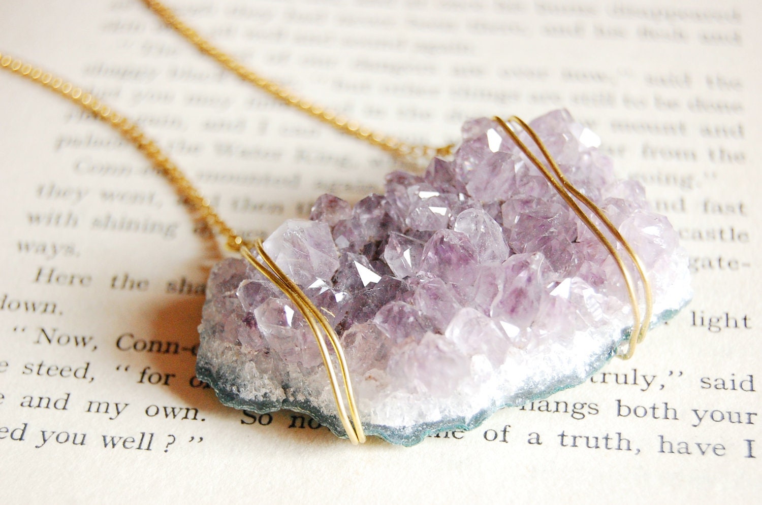 Beautiful light. Large raw amethyst cluster necklace with gold chain details.