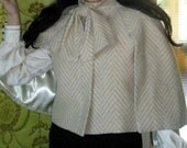 Vintage style cropped jacket /cape in off white wool with bow