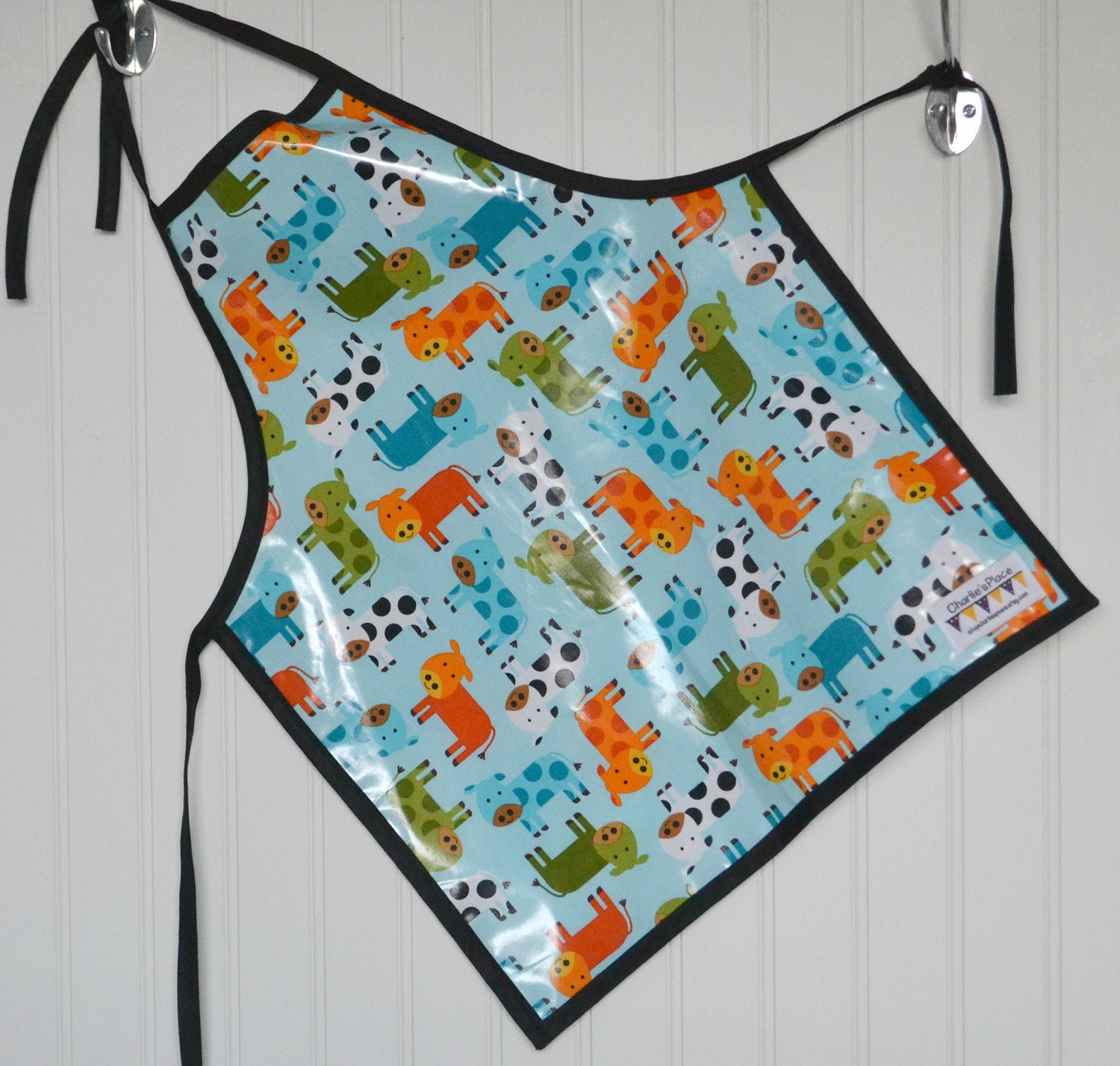 Wipeable Child Apron - Robet Kaufman, cow apron, modern cow, cute cow apron