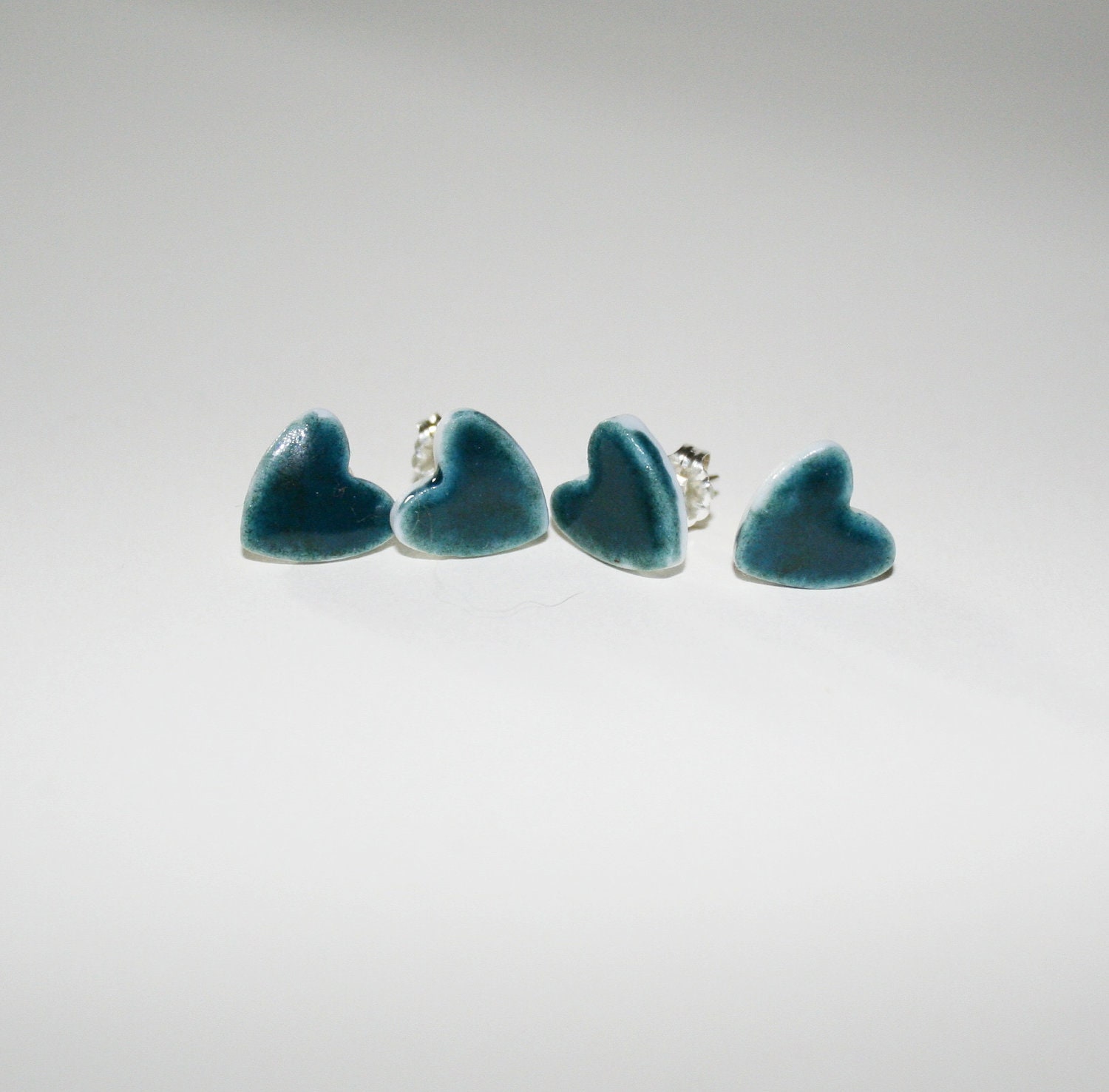 Earrings, stud, heart shaped Valentines porcelain ceramic, dark green glaze, sterling silver post and clip