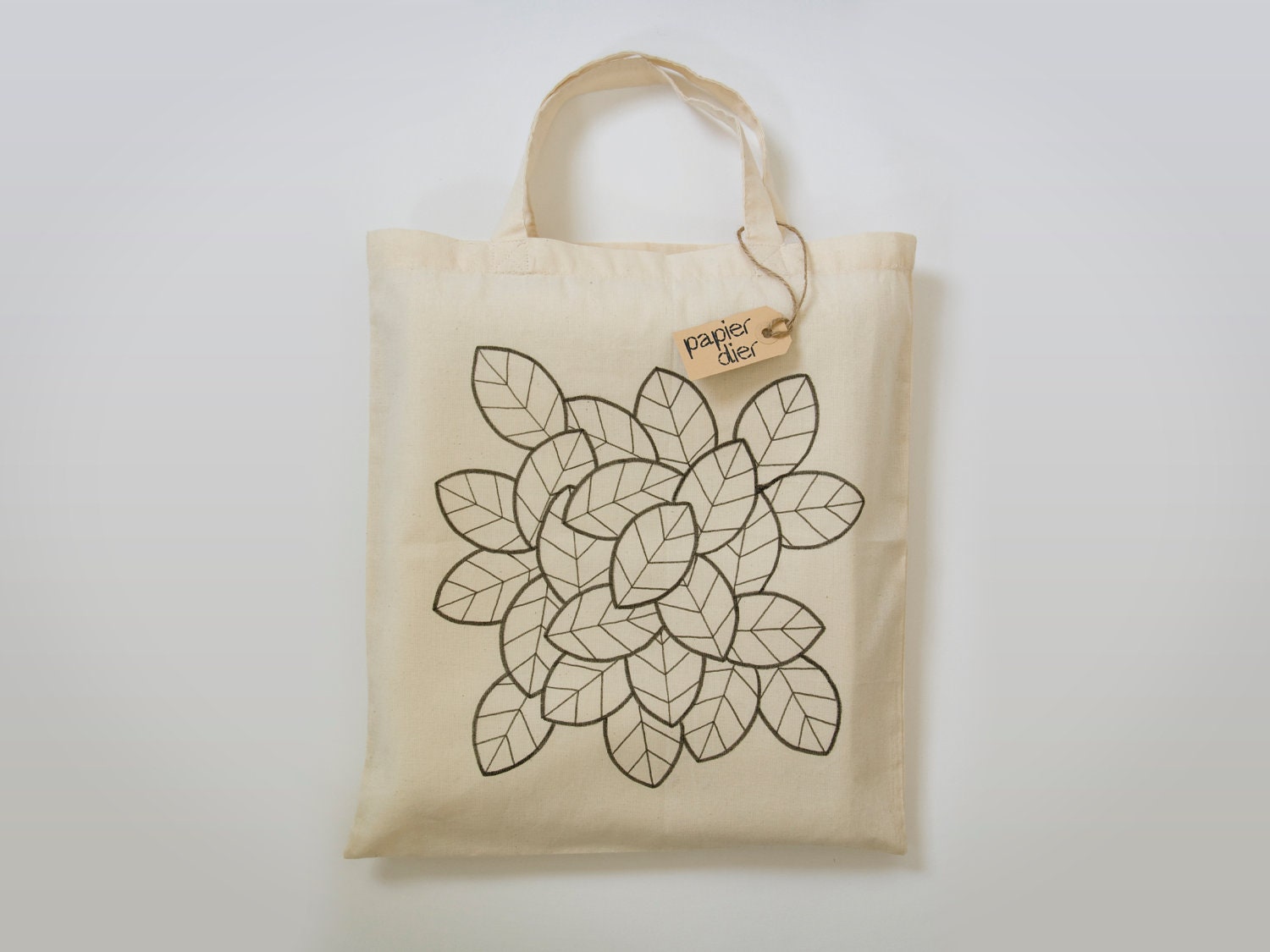 Big cotton tote bag with hand drawn leaf pattern design in black