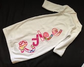 personalized name appliqued on white, pink, or blue newborn layette gown baby boy or girl