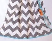 Chevron baby blanket. Blanket size: Size 31 by 40 inches. Colors- gray and white with blue edging.