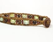 Beaded bracelet.  Green glass beads, bronzite gemstones, copper seed beads. Hippie, boho bracelet.