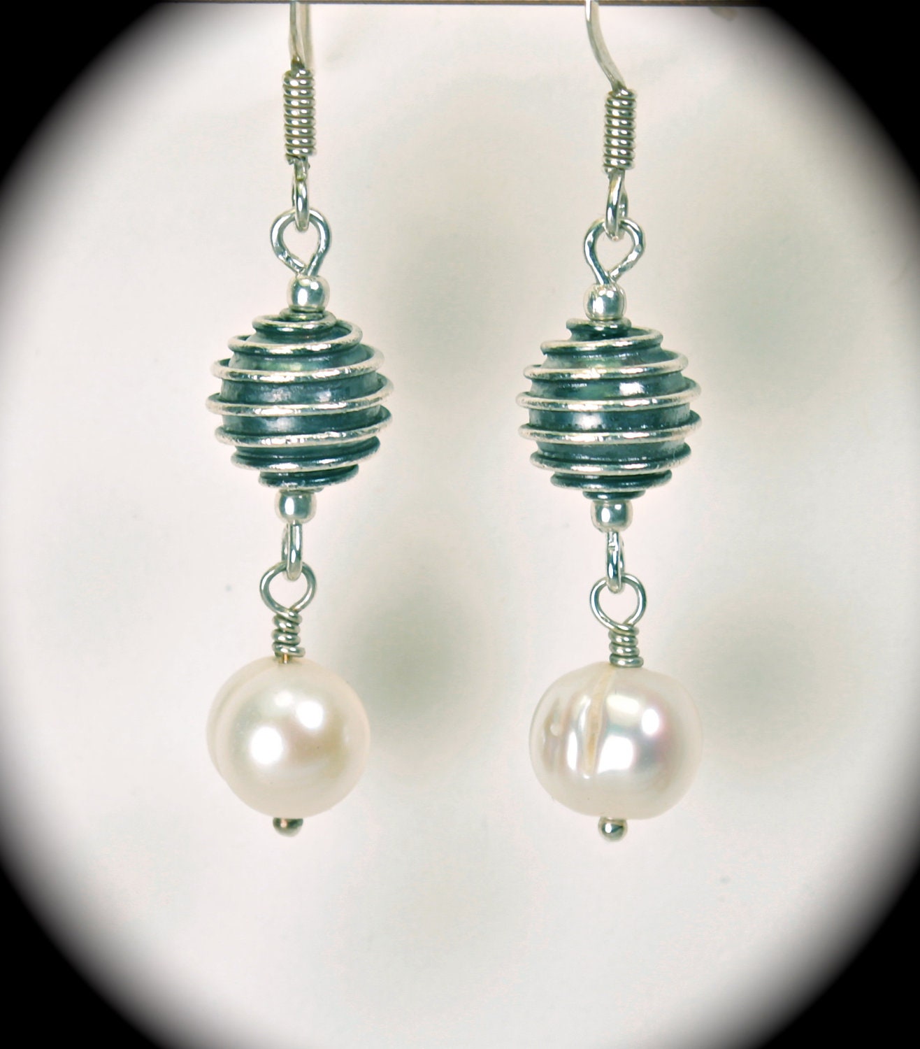 Beautiful and interesting sterling silver Bali bead with lovely creamy white freshwater pearl on sterling ear wires.