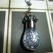 Vintage Light Bulb Filled with Silver Glitter Flakes necklace by vintagerust