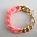 Peachy pink, plastic and metal chain bracelet