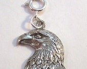 One Pewter eagle Head Charm on a 8mm Silver Spring Ring - Free Shipping in the US - (5030)