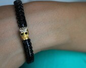crystal rhinestone encrusted skull bracelet - gold or silver