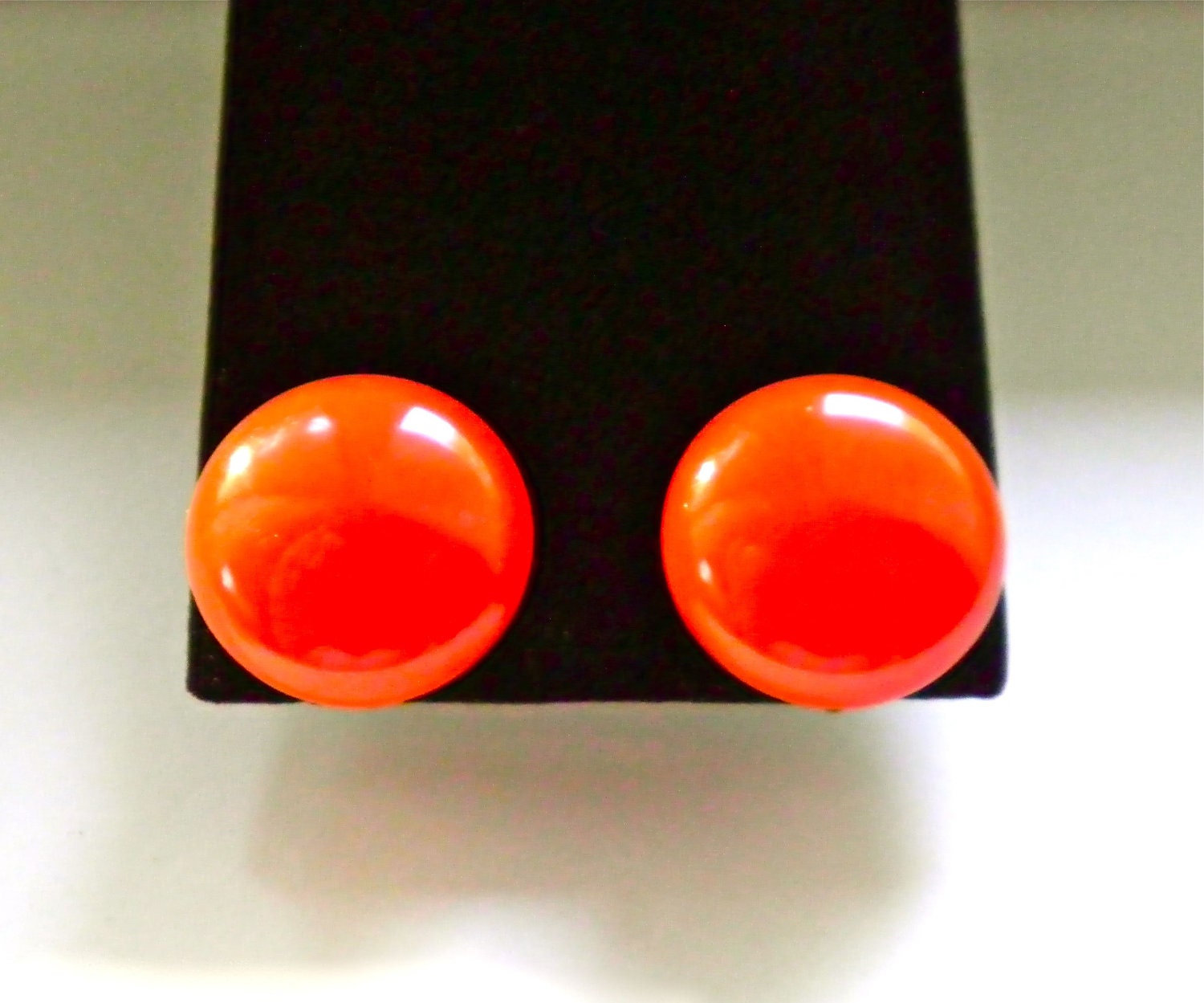 Vintage Bakelite Neon Orange Big Button Earrings